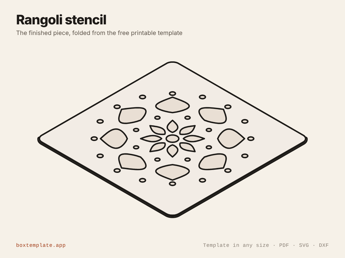 Rangoli stencil folded up from the template — the finished piece